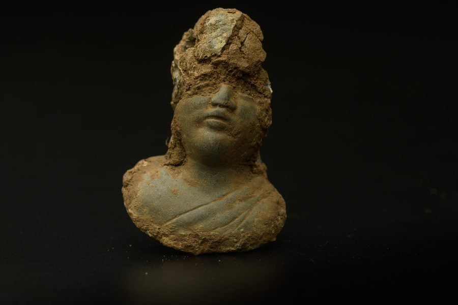 A Roman female deity scale weight uncovered during the archaeology excavation at Blackgrounds.